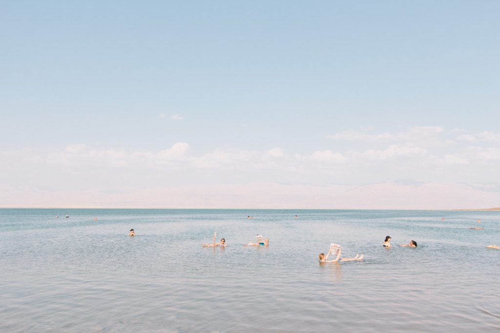 family swimming in the Dead Sea in Israel or Jordan